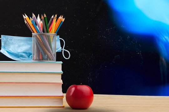 Back To School During Covid Pandemics, Books With Face Mask