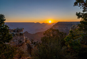 Enjoying the View at Sunrise at South Rim Grand Canyon National Park Mather Point