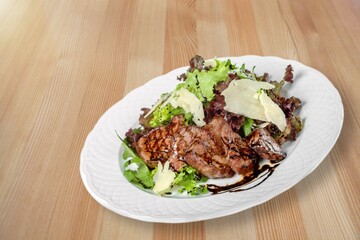 Tasty traditional dish in a copper pan.