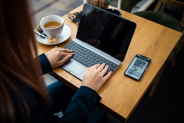 Young woman at caffe break.Work from home.