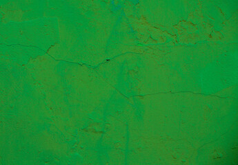 Abstract background from concrete painted with green paint.