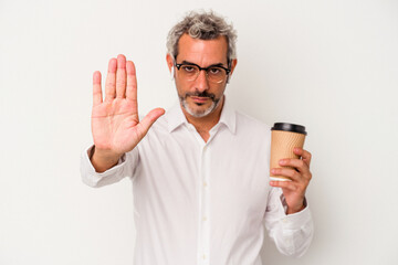 Middle age business man holding a take away coffee isolated on white background  standing with outstretched hand showing stop sign, preventing you.