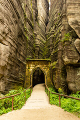 Fototapeta na wymiar Entrance gate Gotická brána at the Adršpach-Teplice Rocks, a unique nature reserve with strange looking rock formations and canyons, Czech Republic