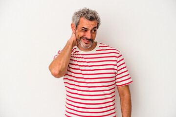 Middle age caucasian man isolated on white background  touching back of head, thinking and making a choice.