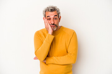 Middle age caucasian man isolated on white background  who is bored, fatigued and need a relax day.