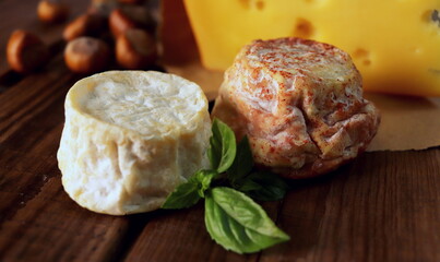 round shape goat cheese closeup selective focus, farm cheeses.