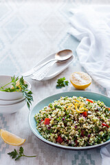 Tabbouleh salad. Traditional middle eastern or arab vegetarian salad with bulgur, parsley, mint and tomato.