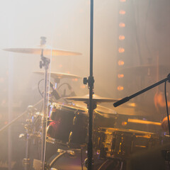 Live rock music photo background, drum set with cymbals