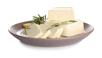 Plate with cut feta cheese, rosemary and lemon on white background