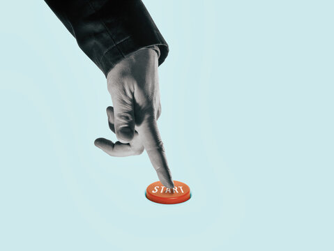 Art collage. The index finger presses the start button. New start