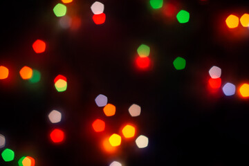 Abstract background with multi-colored bokeh lights