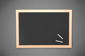 blank green chalkboard on a wall, school and teaching concept,