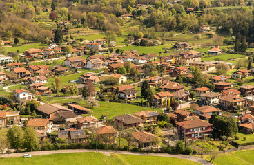 Fototapeta na wymiar Top view of Angera village from the Rocca Borromeo di Angera castle, province of Varese, Italy