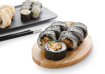 Delicious sushi rolls on white background