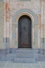 Fototapeta na wymiar metal door to the church of saint nino