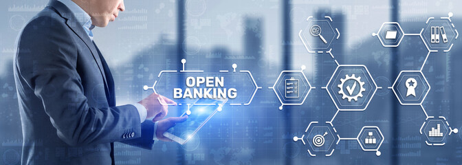 Fototapeta na wymiar Open Banking Online Finance Concept. Man clicks on a virtual screen inscription