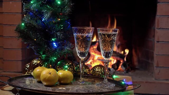 Still life with champagne on fire background, dolly shot