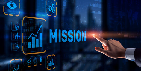 Businessman clicks on virtual screen Mission