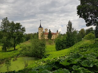 Castle on a hill on a cloudy summer day. Russia, St.Peterburg 
