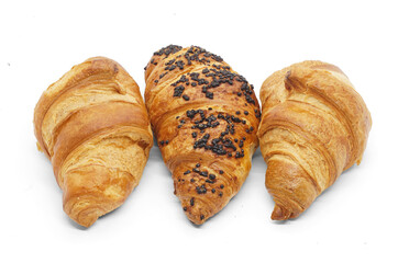 Delicious ruddy fresh croissants isolated on white. Classic and chocolate croissants are arranged in one row.