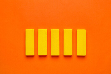 Yellow blocks on orange background
