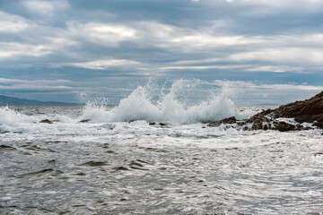 Blue and grey ocean waves crashing
