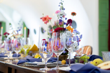wedding decoration on the white table with fruits, flowers