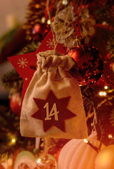 Christmas background. Advent calendar .Advent calendar in the form of an eco bag hangs on the...
