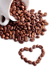 White cup with coffee beans