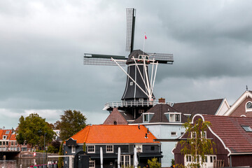 Fototapeta na wymiar Molen de Adriaan or Adrian Windmills in Haarlem, the capital of North Holland