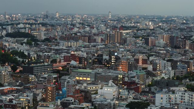 Time lapse day to night transition of Tokyo cityscape in Japan
