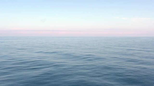 Beautiful soothing ocean views. View from the ship to the calm sea.