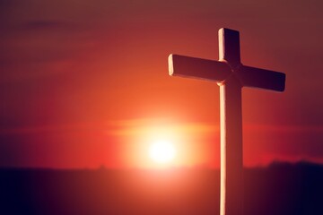 Wooden cross at sunset, crucifixion of Jesus Christ
