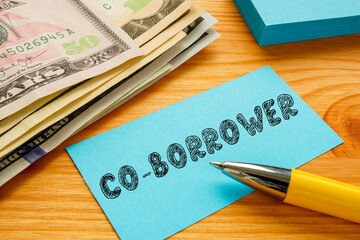 Financial concept about CO-BORROWER with inscription on the sheet.