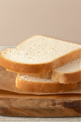 Loaf bread on cutting board.