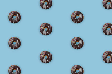 The black doughnut pattern on top of the blue background.