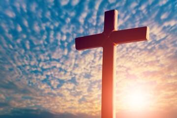 Wooden cross at sunset, crucifixion of Jesus Christ