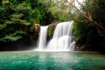 Fototapeta na wymiar Klong Chao waterfall at Koh Kut, Trat, Thailand. Beautiful waterfall in tropical forest.
