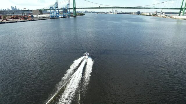 Aerial View of Pleasure Boat Speeding along the Delaware Rivee