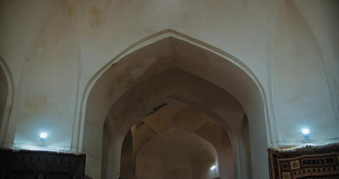 Inside the old mosque of Bukhara, Uzbekistan. Carpet shop under the dome. Old architecture. 1 of 3