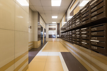 mailboxes in the lobby of an apartment building
