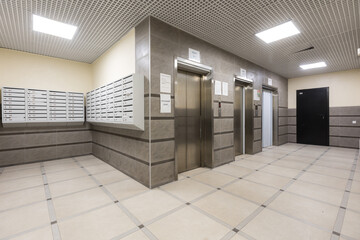 mailboxes in the lobby of an apartment building