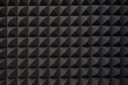 Dark gray background with geometric square shape to support various basic needs of visual design art.