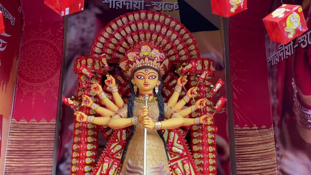 Camera back movement footage, clay idol of devi durga closeup shot, Durga puja festival, Kolkata.