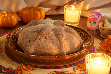 bread of the dead with candles for the altar of the day of the dead in mexico