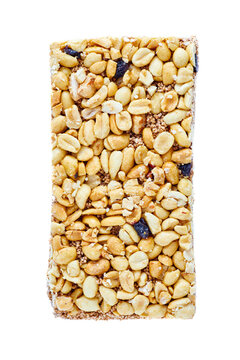 La palanqueta de amaranto, cacahuate y pasitas es un dulce t&iacute;pico mexicano.  Palanqueta con amaranto, cacahuate y pasitas es cubierta con miel en  fondo blanco.