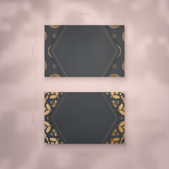 Business card template in black with Indian gold ornaments for your business.