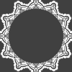 A postcard in black with an abstract white ornament prepared for typography.