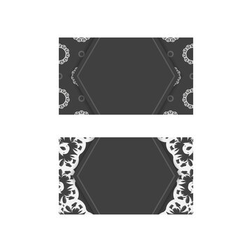 Business card in black with Indian white ornaments for your business.