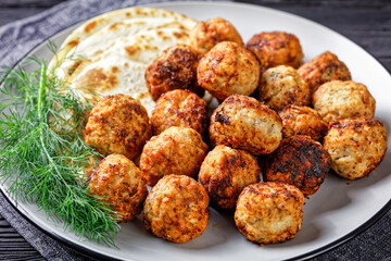 Keftedakia, fried greek meatballs on a plate